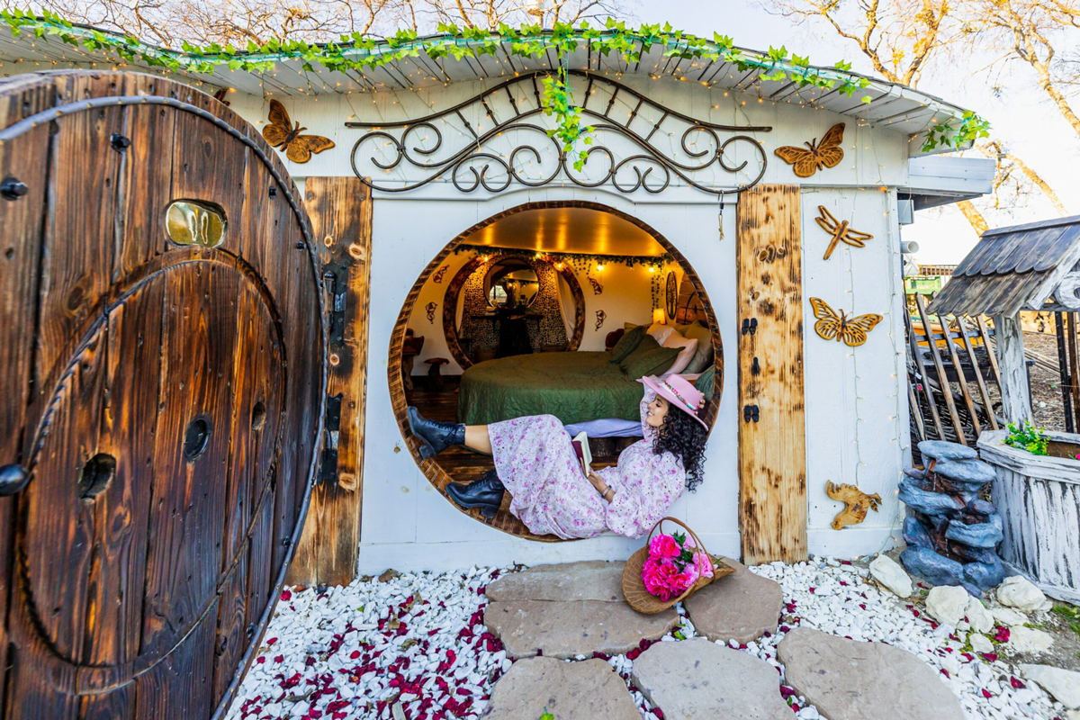 Texas Influencer @mycurlyadventures at the Hobbit House Airbnb in McKinney