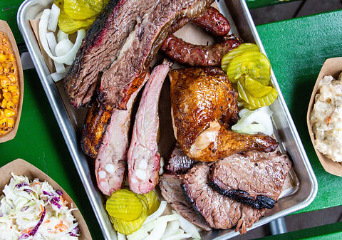 A Texas barbecue feast like no other—brisket, ribs, smoked chicken, and all the fixings for a perfect meal!