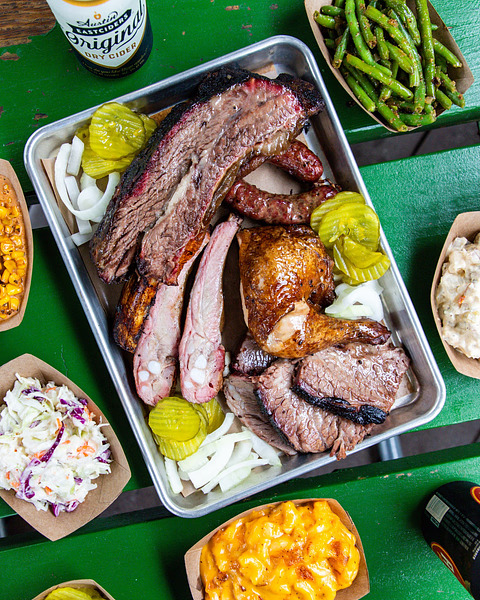 A Texas barbecue feast like no other—brisket, ribs, smoked chicken, and all the fixings for a perfect meal!