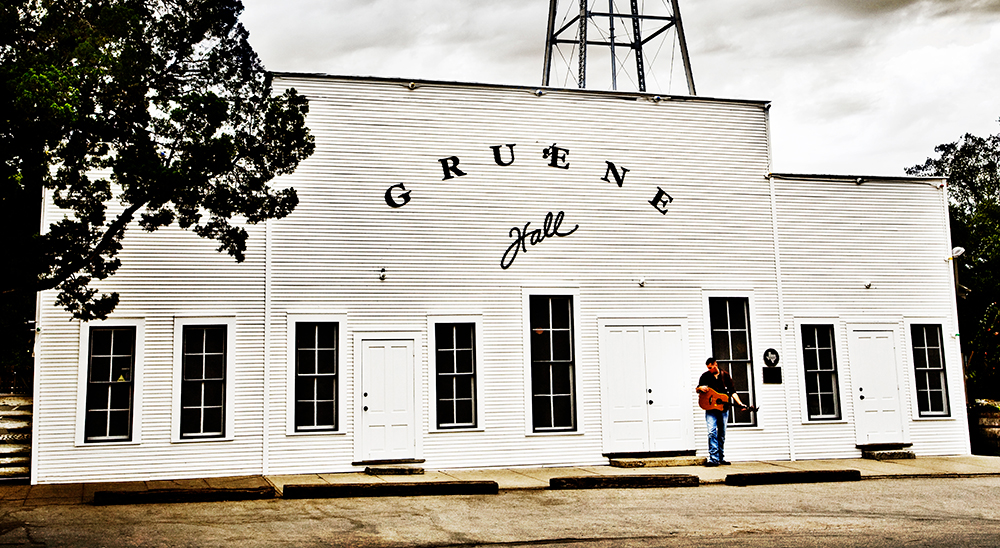 Standing where history hums and melodies echo—Gruene Hall, where Texas music lives on. 🎶🤠