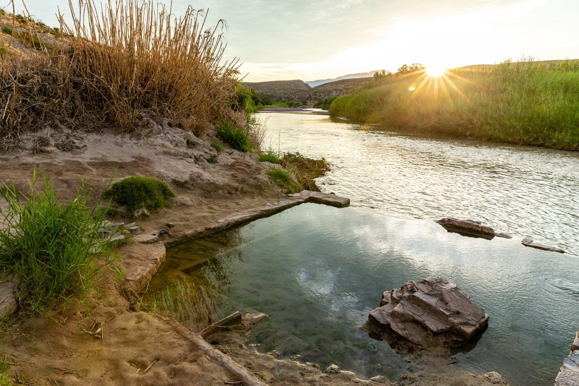 Sunset over the tranquil hot springs along the Rio Grande.| Source: texashighways.com