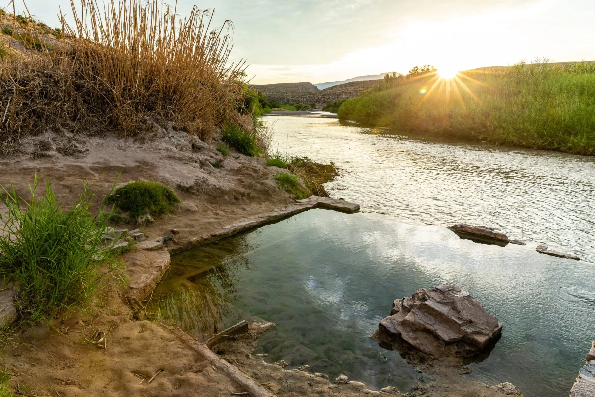Sunset over the tranquil hot springs along the Rio Grande.| Source: texashighways.com