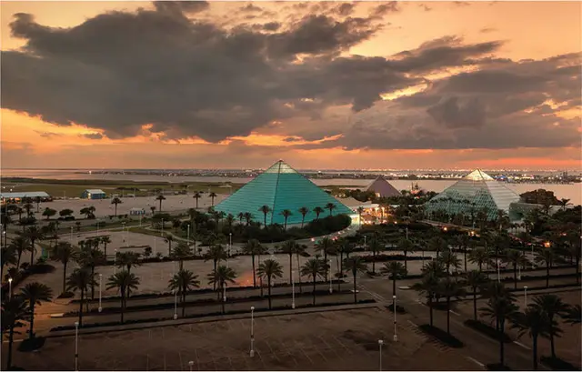 Where the Gulf meets the sky — pyramids of Galveston glowing at dusk. | Source: themeetingprofessionaldigital.org