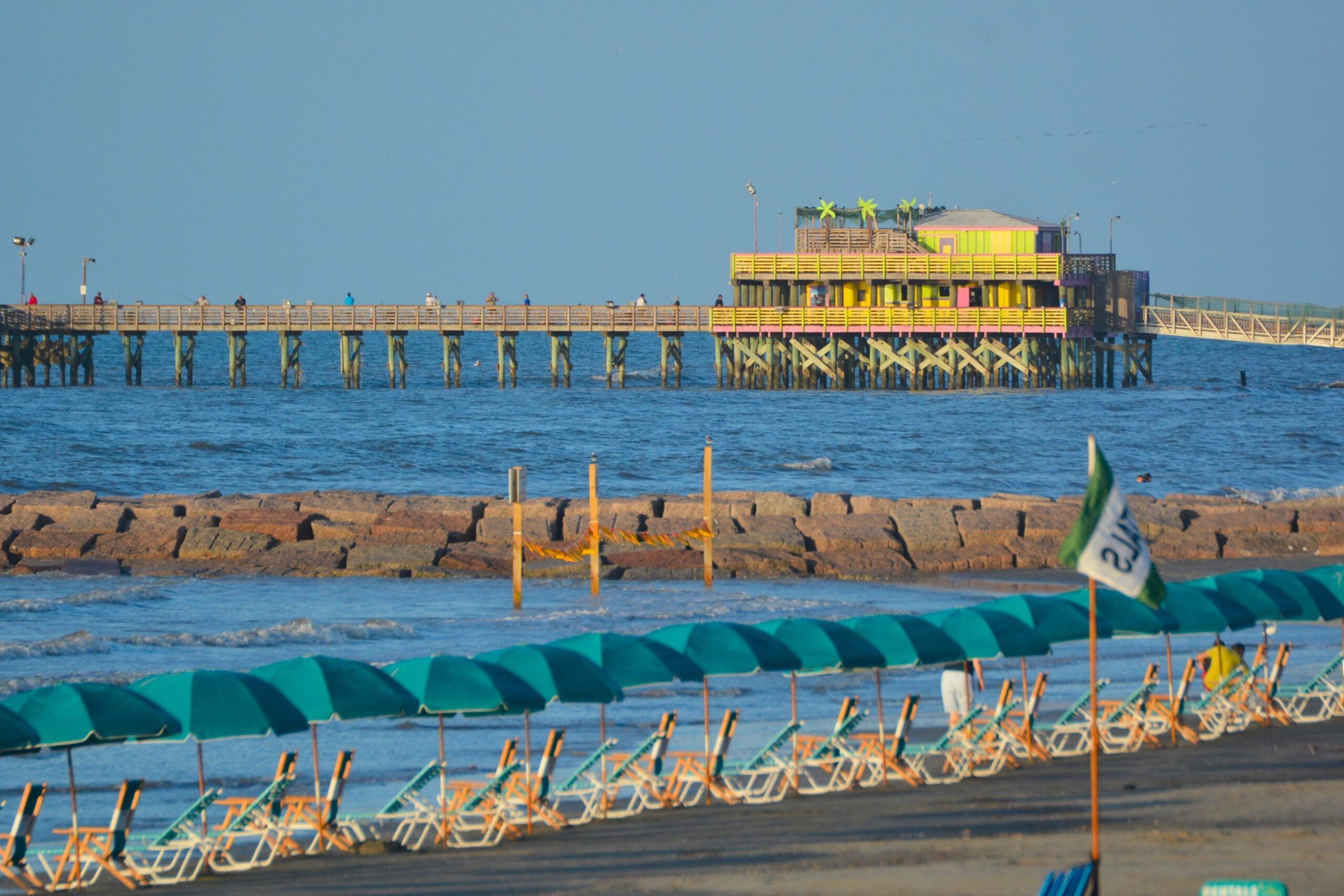 Breezy chairs, salty air, and vibrant vibes — welcome to Galveston's laid-back paradise. | Source: galvestonparkboard.org