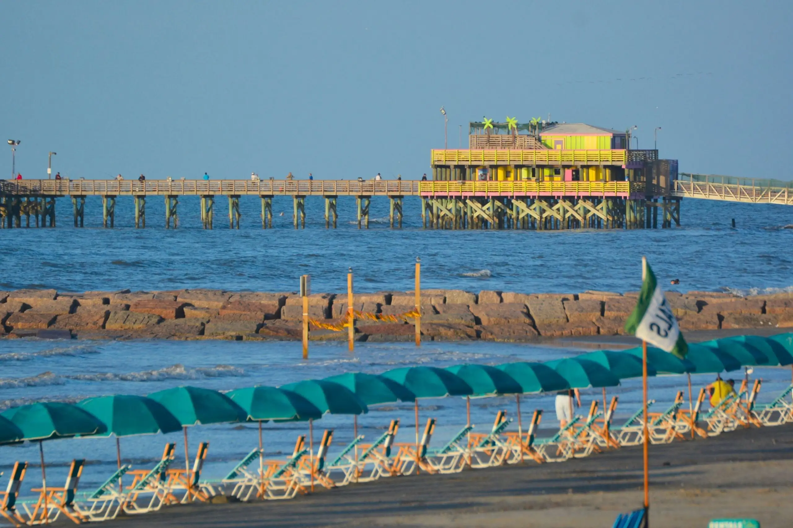 Breezy chairs, salty air, and vibrant vibes — welcome to Galveston's laid-back paradise. | Source: galvestonparkboard.org