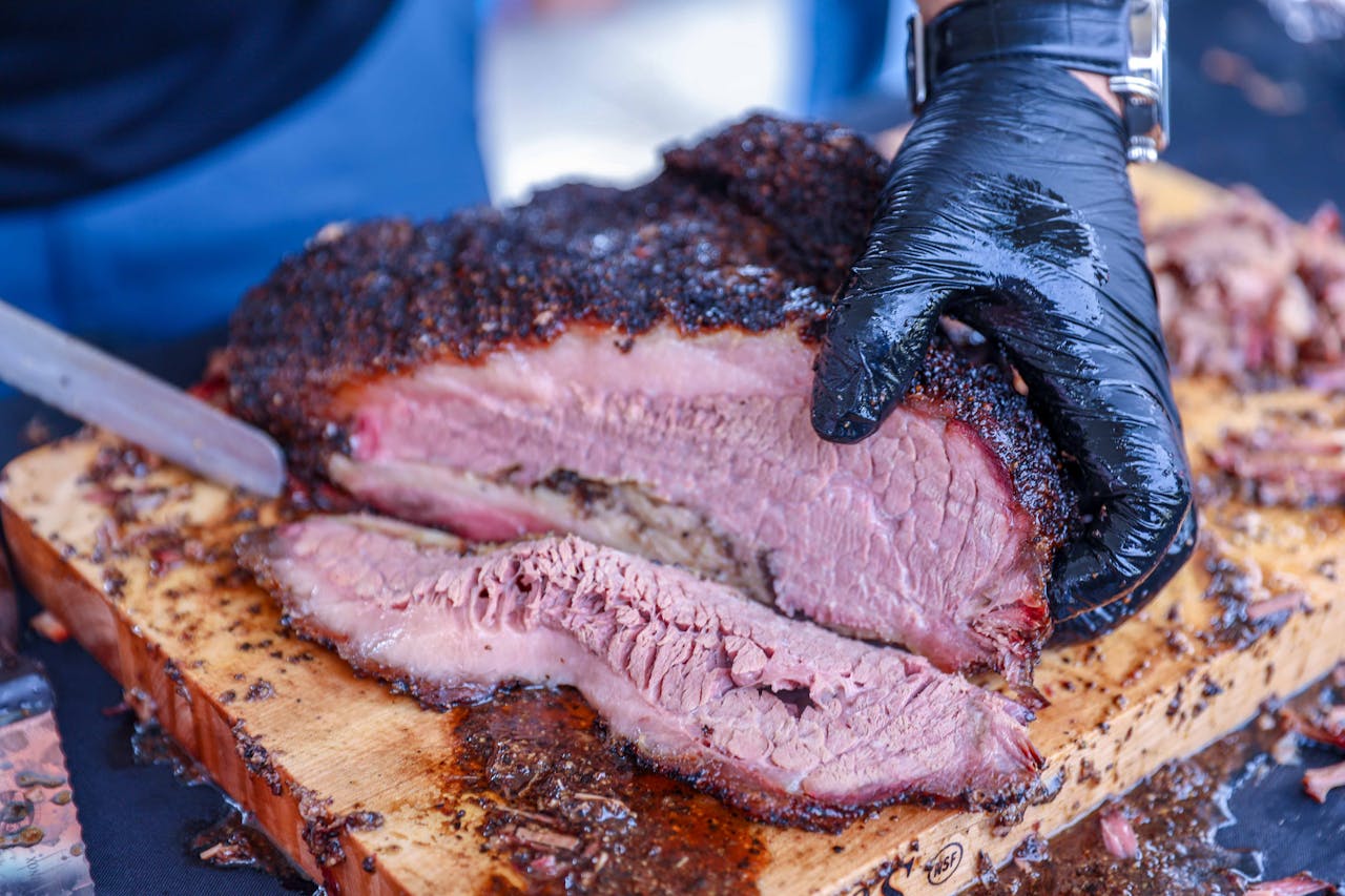 Smoked brisket is part of Texas winter food traditions and holiday meals locals eat