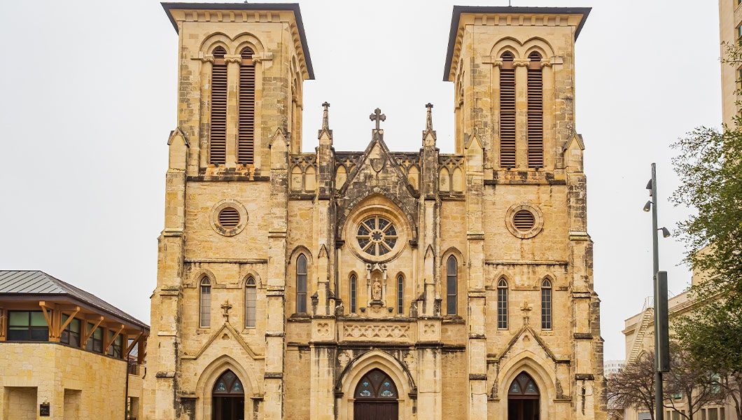 San Fernando Cathedral in San Antonio, built in 1731 and recognized as one of the oldest churches in Texas, with twin towers and historic stone architecture.