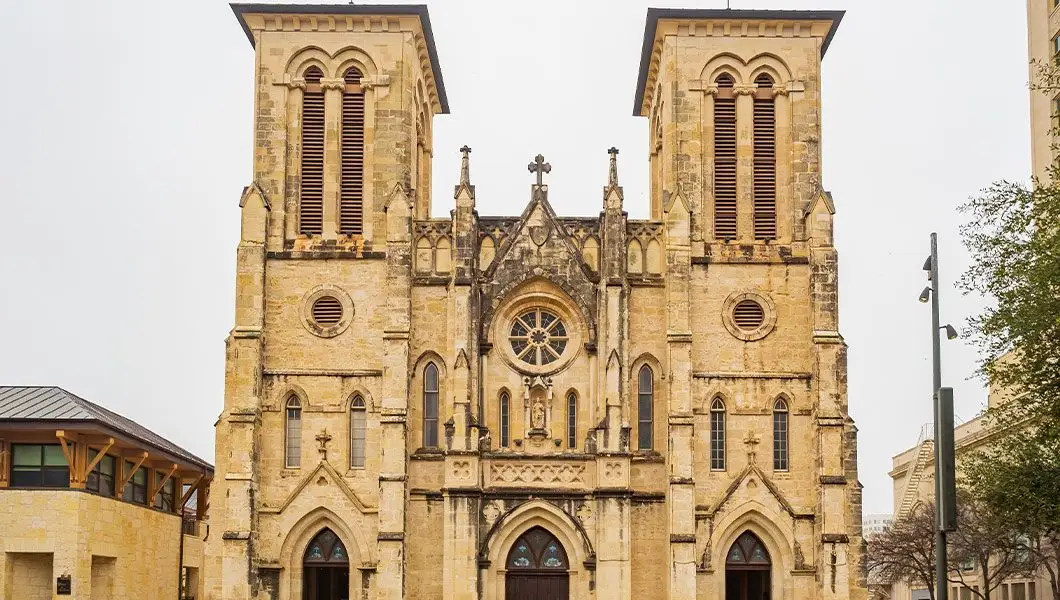 San Fernando Cathedral in San Antonio, built in 1731 and recognized as one of the oldest churches in Texas, with twin towers and historic stone architecture.