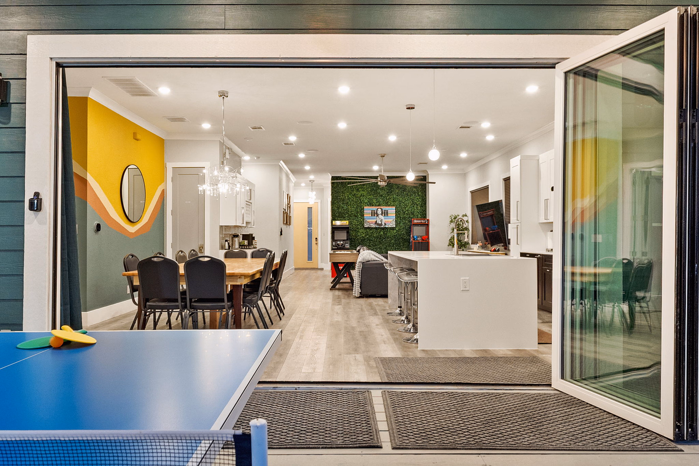 Open the doors and let the whole house spill into the backyard.