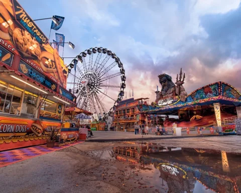 2026 Houston Rodeo midway with Ferris wheel, carnival rides, and food stands during the citywide celebration