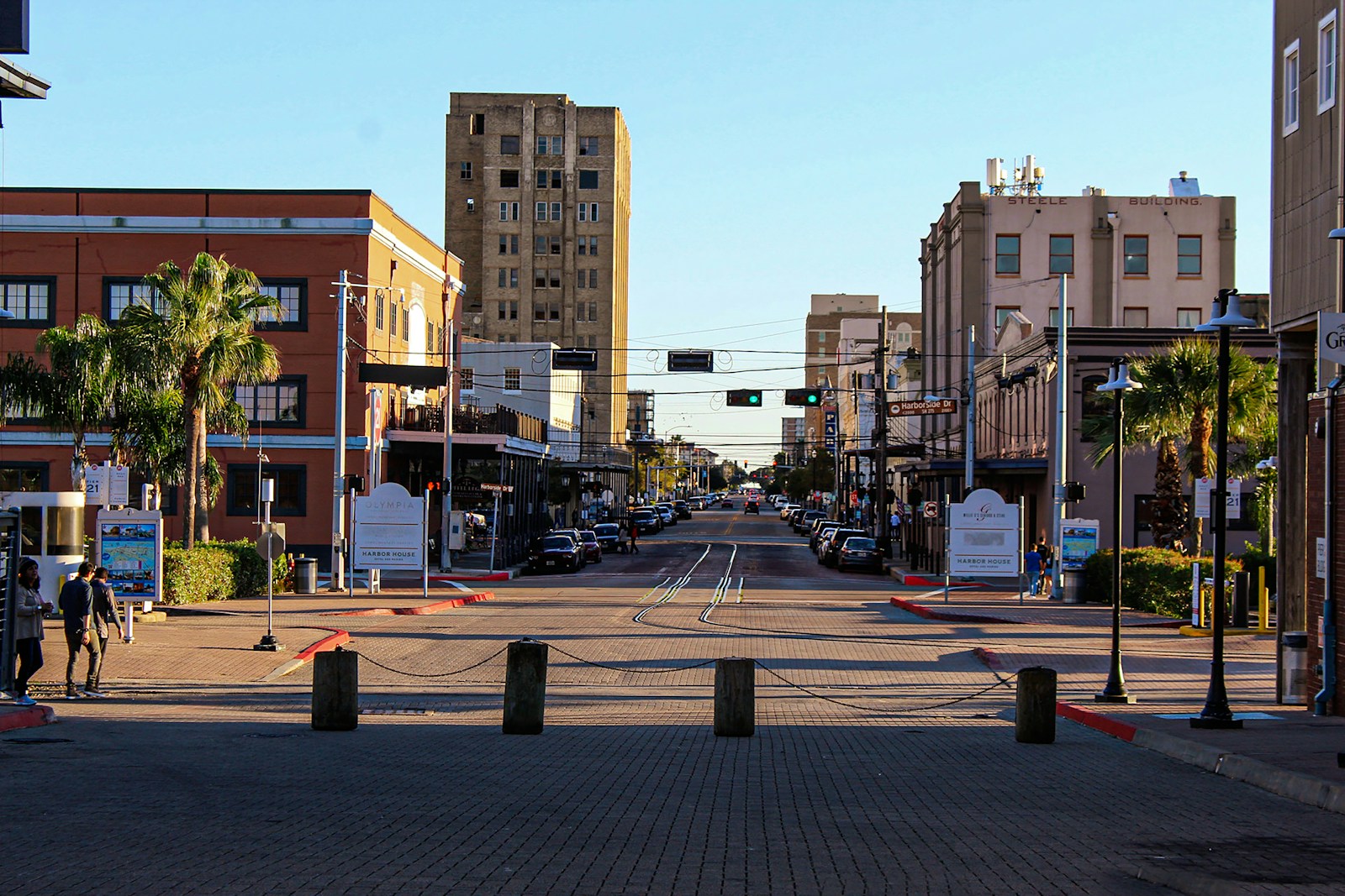A palm-lined street in historic downtown Galveston