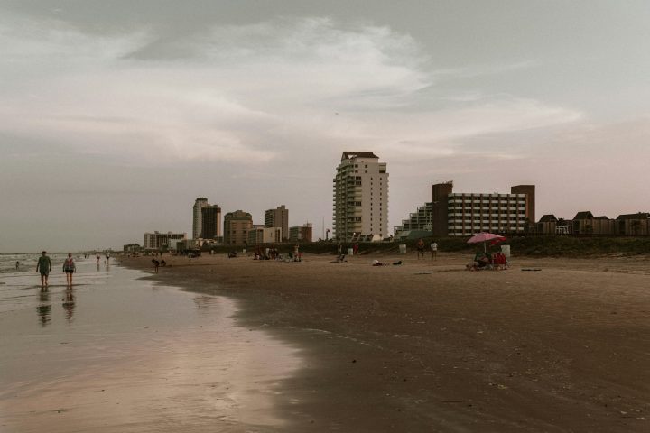 Beachgoers on the sand at South Padre Island