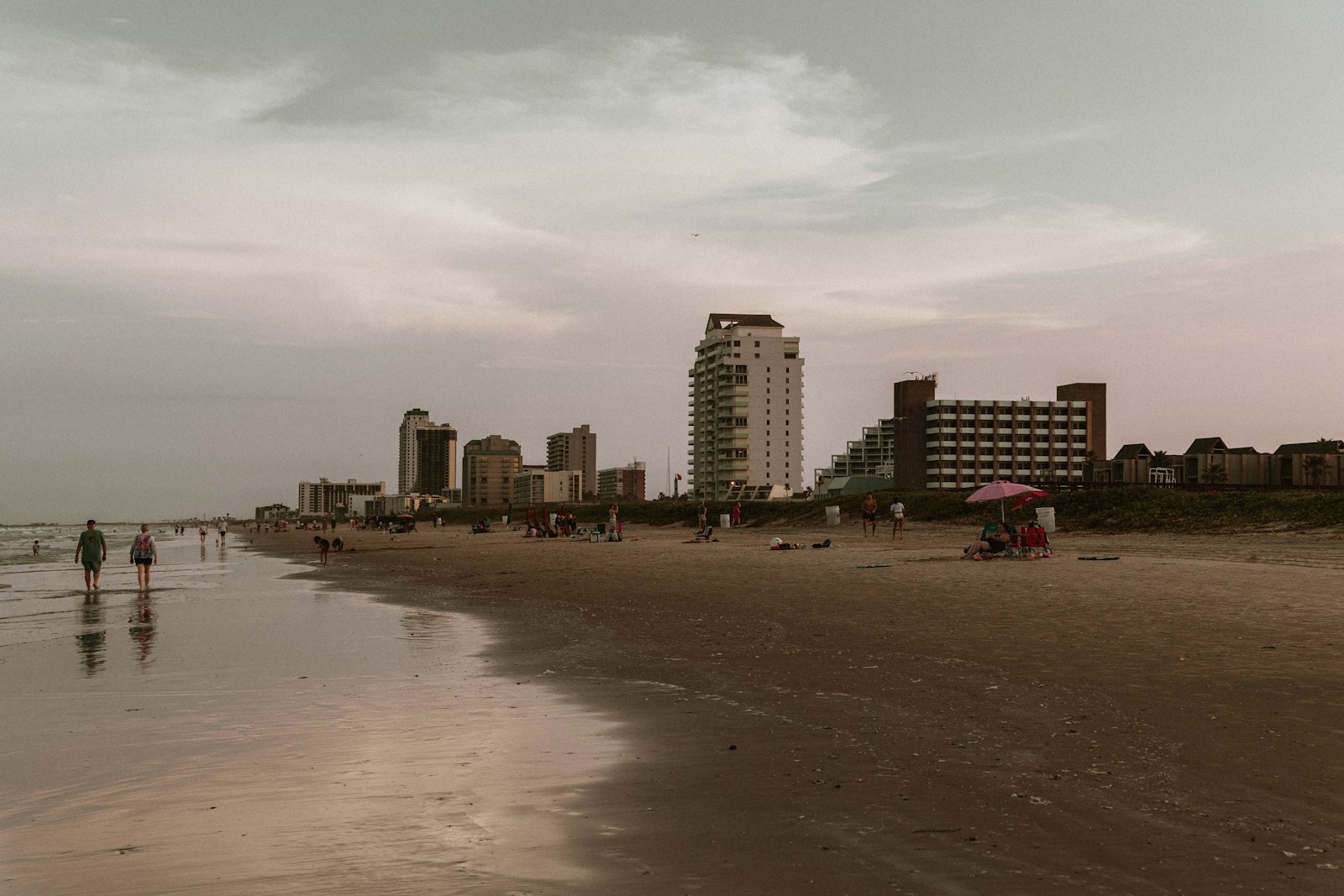 Beachgoers on the sand at South Padre Island