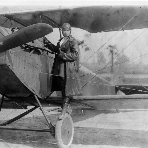 Bessie Coleman with her plane in 1922