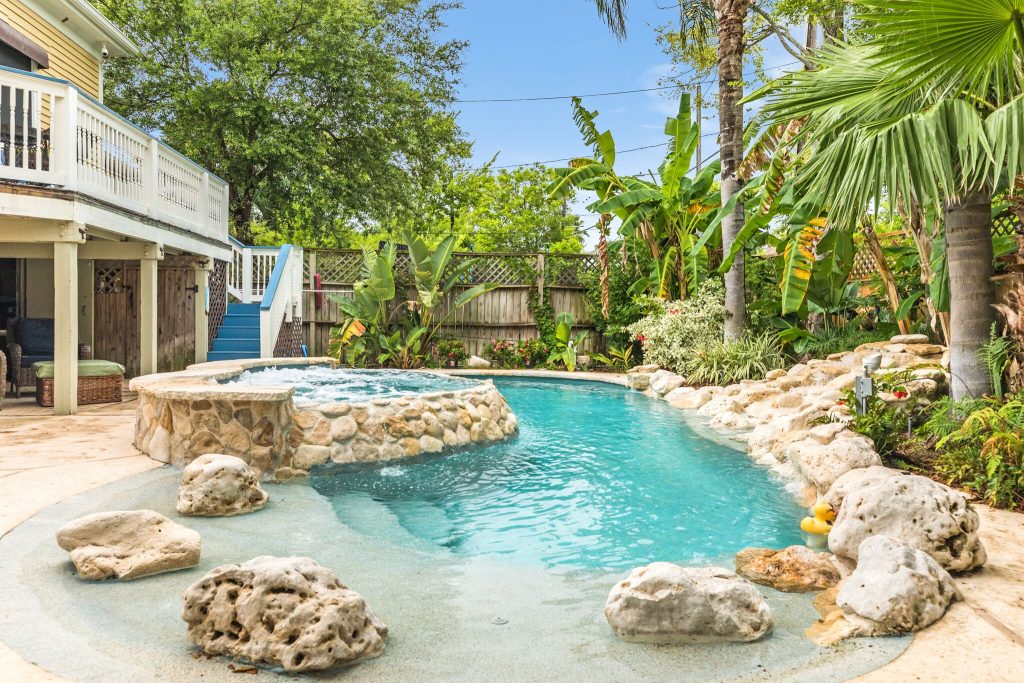 The lagoon-style pool at the Blue Lagoon, a historic home in Galveston's East End