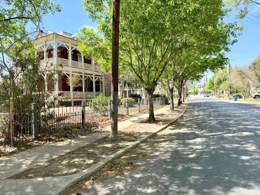 Historic homes lining a street in the King William neighborhood, steps from the townhome.