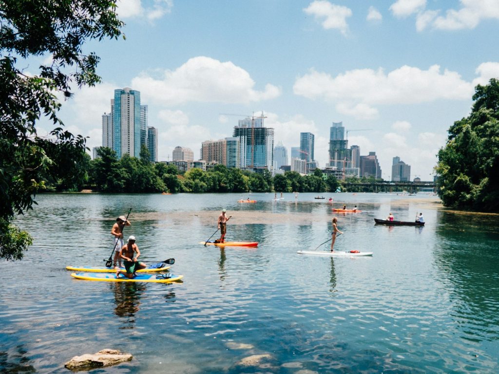 Paddlers on Lady Bird Lake, seen from Lou Neff Point on the Butler Trail.