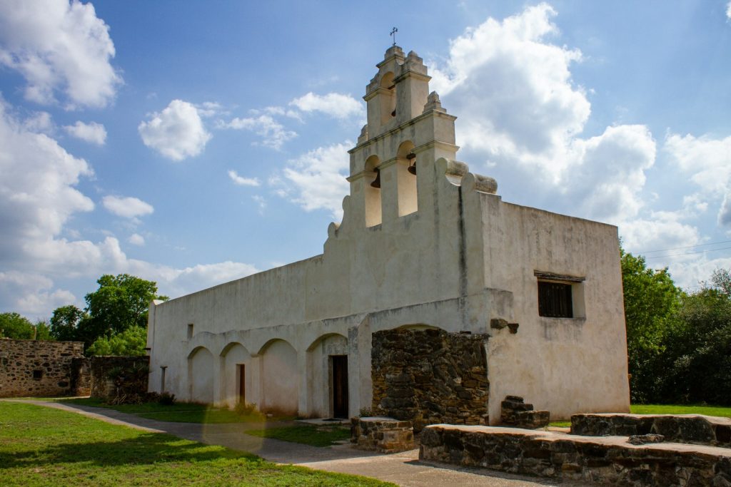 The simple white church at Mission San Juan.