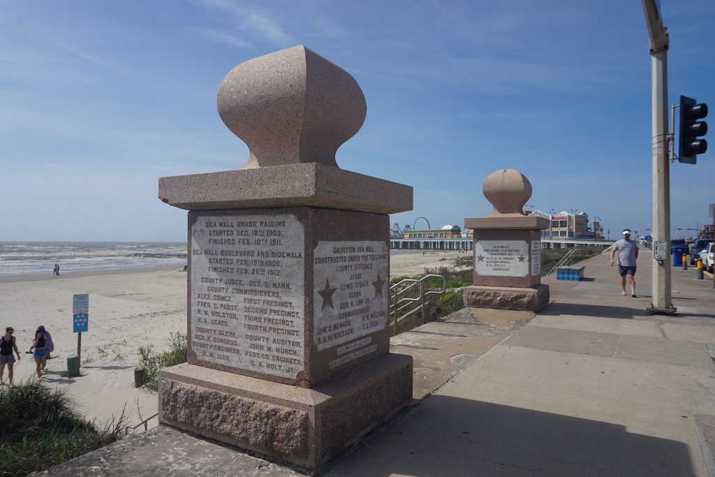 Monuments along the Galveston Seawall, home to many of the island's beachfront hotels