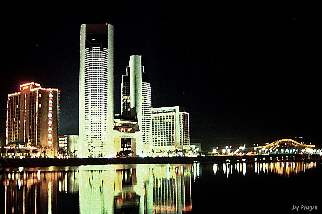 The Corpus Christi bayfront at night, where Mirador de la Flor overlooks the water