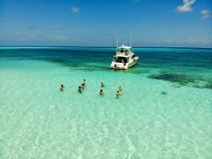 Turquoise water and a boat off Cozumel, Mexico