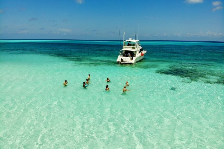 Turquoise water and a boat off Cozumel, Mexico