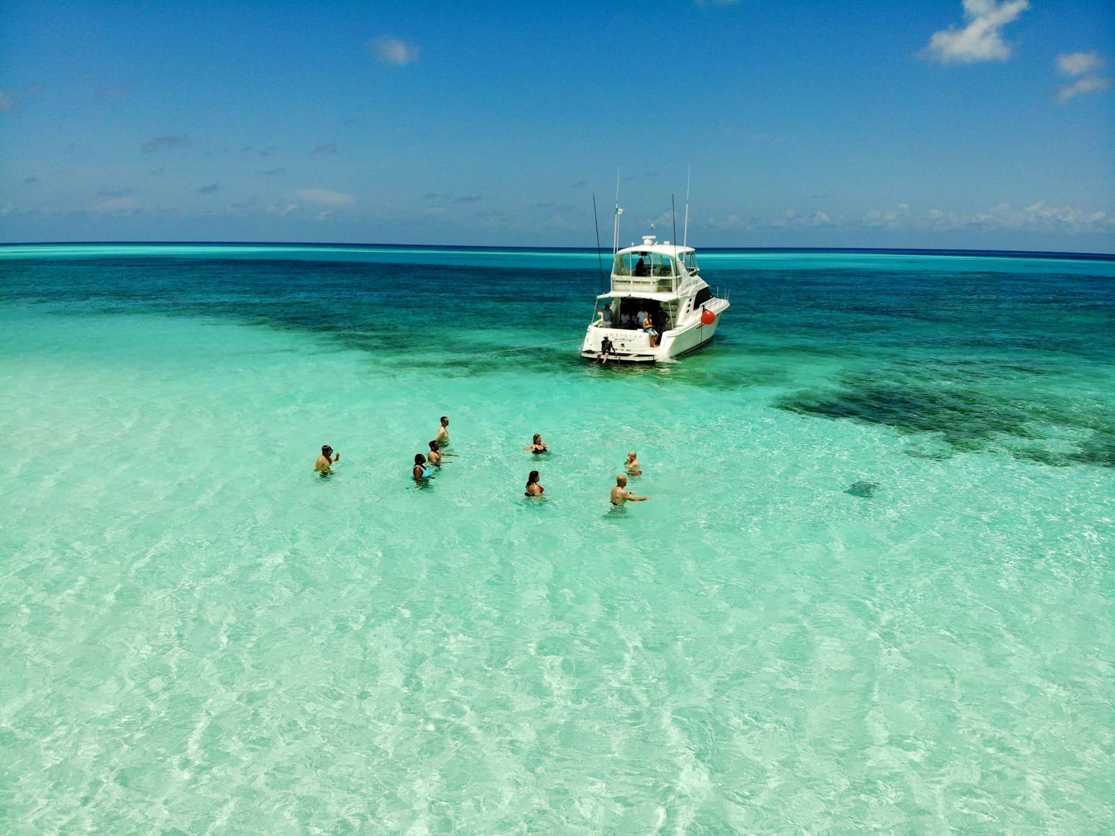 Turquoise water and a boat off Cozumel, Mexico
