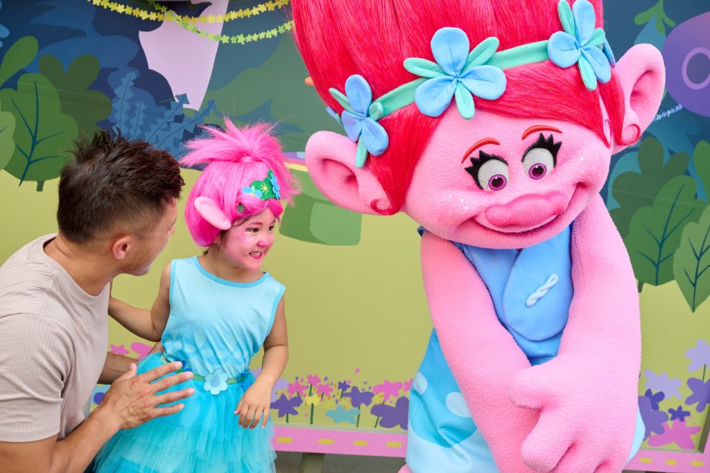 Poppy meets young guests at DreamWorks TrollsFest at Universal Kids Resort
